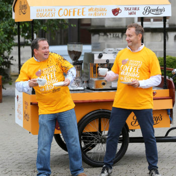 19/8/16 ***NO REPRO FEE*** On yer coffee trike! Mario Rosenstock and Davy Fitzgerald saddle up for Ireland’s Biggest Coffee Morning for Hospice 2016 Mario Rosenstock and legendary Clare manager, Davy Fitzgerald are calling on people across the country to get on board for Ireland’s Biggest Coffee Morning for Hospice together with Bewley’s on Thursday 15th September. Putting their barista skills to the test, the duo urged people to host a coffee morning or to share a cup of Bewleys’ coffee to support their local hospice and their vital work caring for people in their local communities nationwide. To get involved visit www.hospicecoffemorning.ie or call 1890 717 000. Mario Rosenstock said, “I’ve been delighted to be involved with the hospice for a few years now and in that time I've seen at first-hand the work they do and the care they give. To continue giving this care, hospice services across the country need vital funds and Ireland’s Biggest Coffee Morning for Hospice is the one day when everyone can get involved and help them to do just that. Whether you host a coffee morning of your own or visit a local coffee morning to enjoy a Bewley’s coffee, your support is key as every cup counts”. Pictured at the launch at Our Lady’s Hospice, Harold’s Cross were (l-r) Mario Rosenstock and Davy Fitzgerald Pic: Marc O'Sullivan